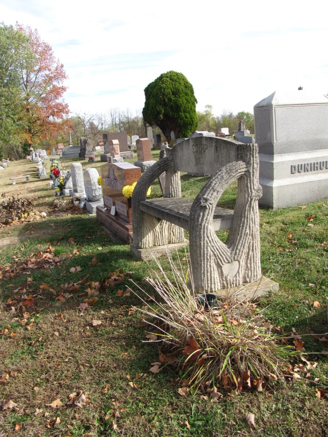 Note the heart shaped carved into the bench.